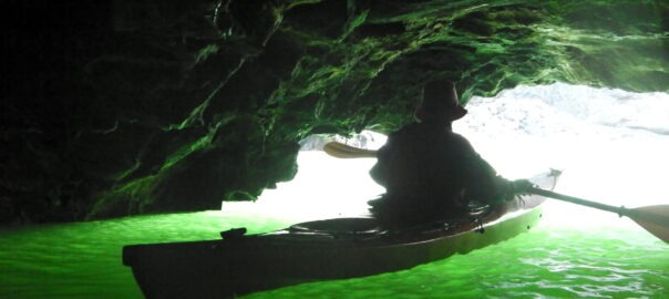 Sea kayak entering the Witches Cauldron in Pembrokeshire