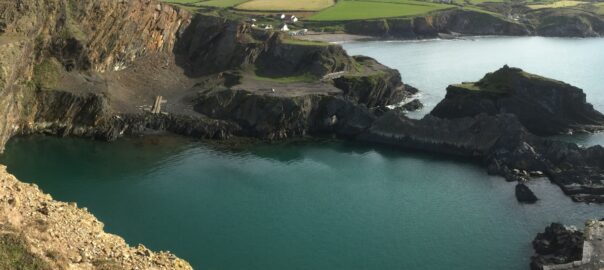 Sea kayak on calm water inside the Blue Lagoon near Abereiddy, Pembrokeshire