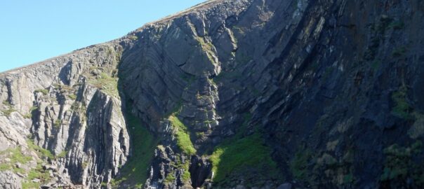 Sea kayaking near The Devil’s Scratch cliff formation