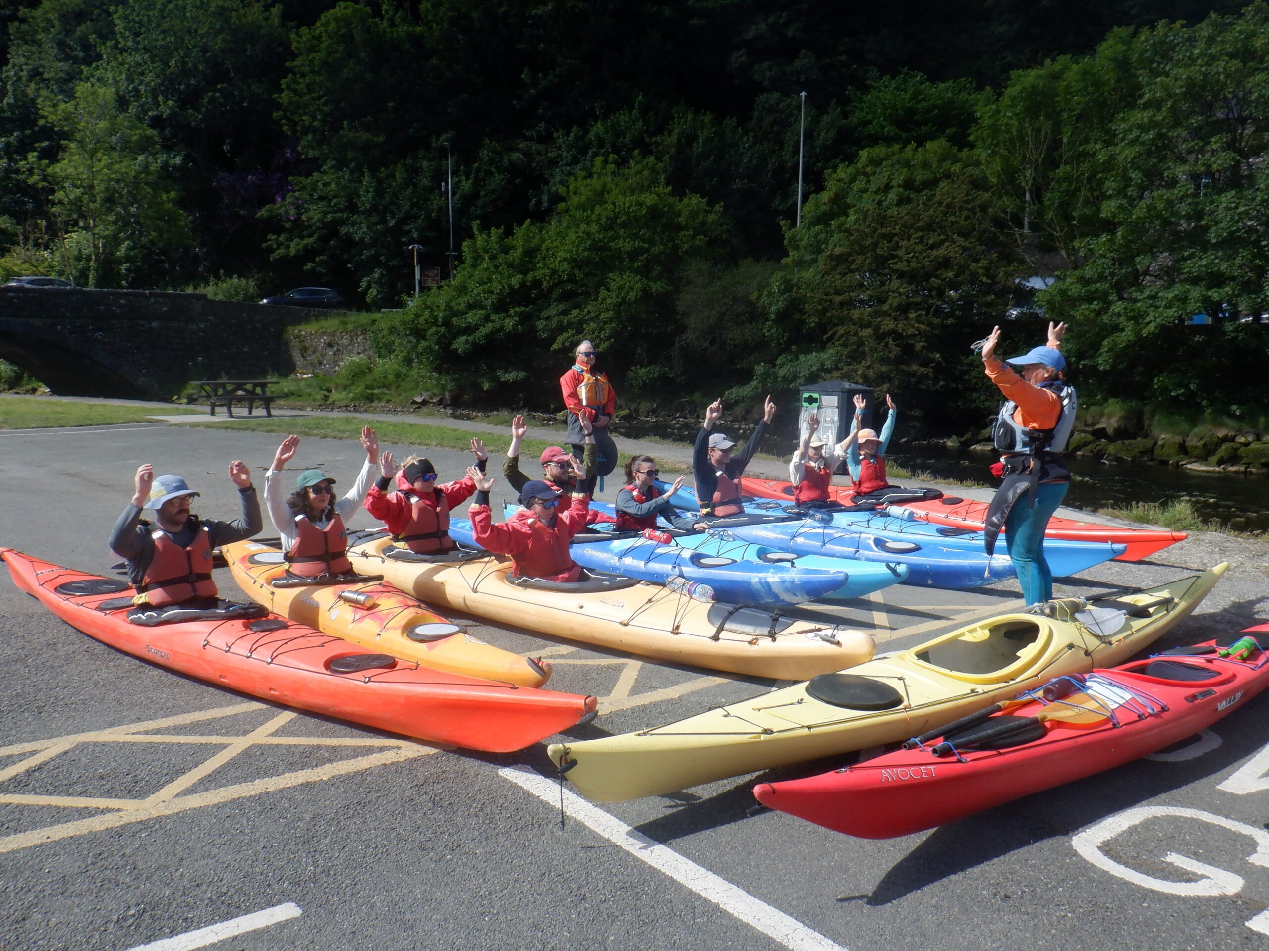 Guests enjoying a sea kayaking adventure with Mayberry Kayaking in Pembrokeshire.