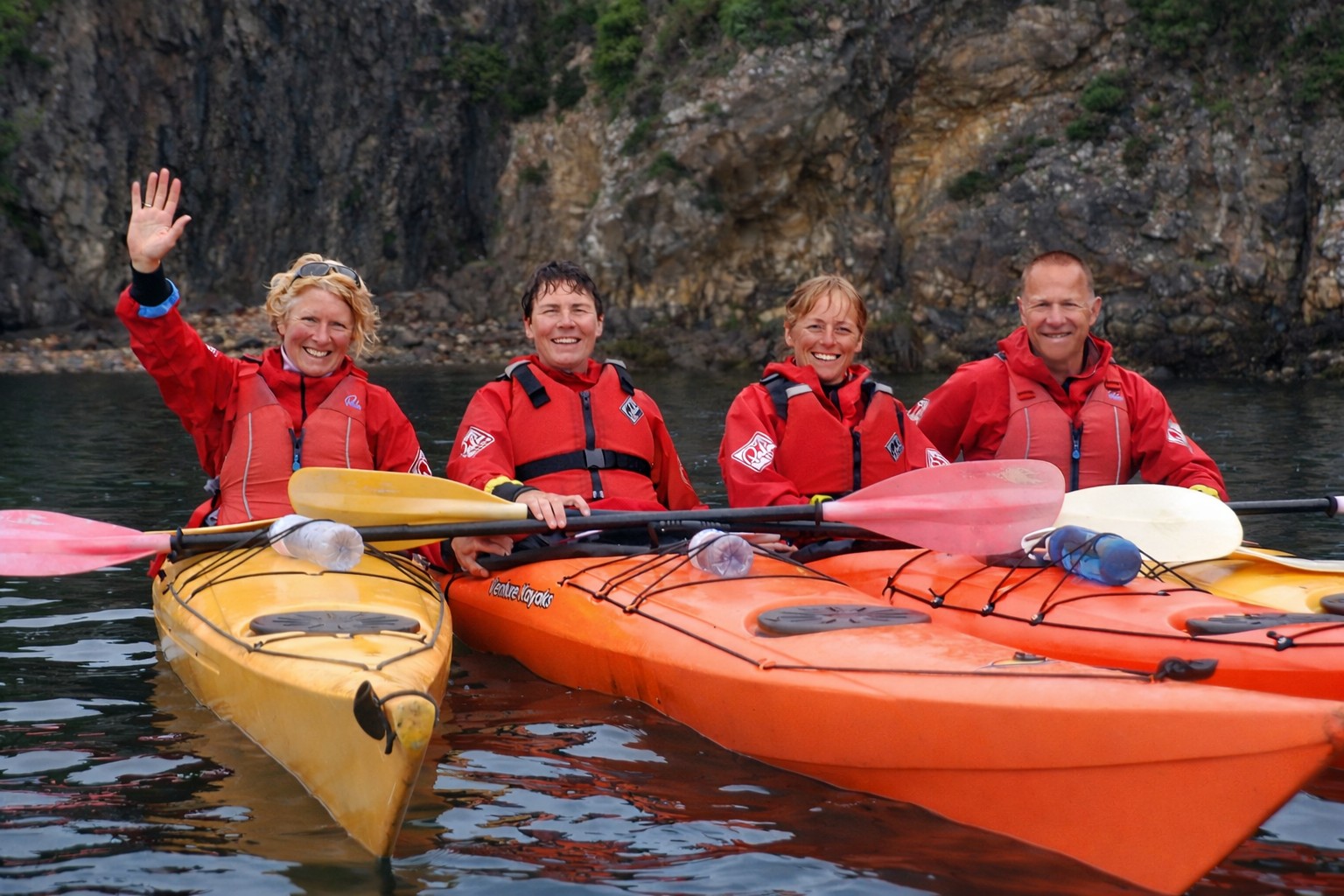 Sea kayaking Pembrokeshire small group calm conditions briefing before launch