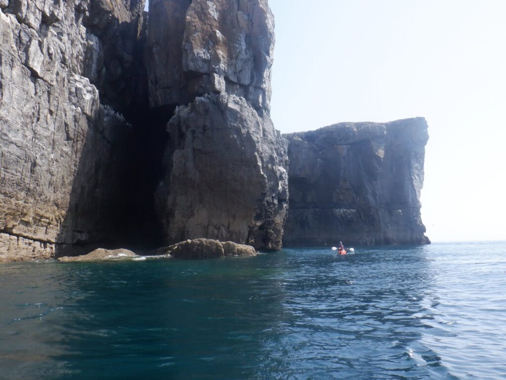 Dramatic Pembrokeshire coastline viewed from a sea kayak